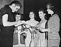 Elvis signs autographs in Minneapolis 1956
