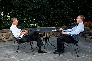 Barack Obama and Dakota Meyer sharing a beer