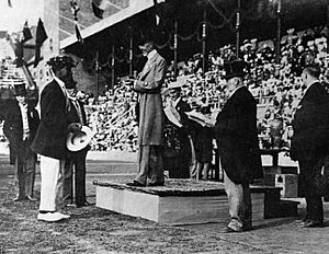 Duke Kahanamoku accepting the Olympic Gold Medal from King Gustav, Stockholm, Sweden 1912