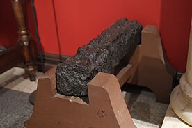 Pig iron ballast from Captain James Cook's HM Bark Endeavour in the New Zealand Maritime Museum. This piece of ballast was recovered from the Great Barrier Reef in Australia, where Endeavour had gone aground in 1770