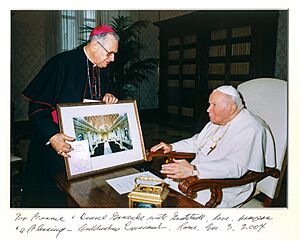 Archbishop Oscar Hugh Lipscomb presenting photo to Pope John Paul II