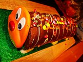 Caterpillar chocolate cake (8367463320).jpg