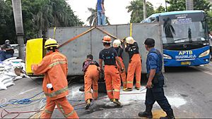 Indonesian fire fighters during a traffic accident