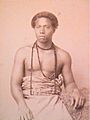 Young man in 'ie toga lavalava, photograph by Thomas Andrew