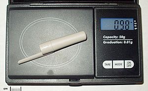 Gram (pen cap on scale)