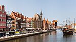 Gdansk waterfront and a old-style ship in the channel