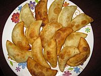 Home-made Puli piṭha; popular in winter in Bangladesh
