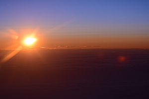 Sunset over the North Pole at the International Date line at 20,000 feet Aug 6th 2015 by D Ramey Logan