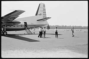 Charles Perkins greeted on tarmac at Inverell Airport, February 1965 - The Tribune (20103546323)