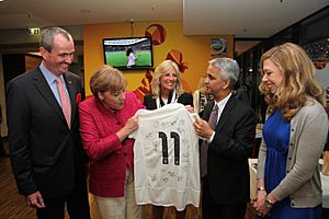Chancellor Merkel is Presented with an Autographed U.S. Women's Jersey (5984656852)