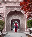 Lady in arch of Shahi Mosque, Chitral