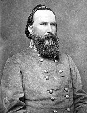 Portrait photograph of Longstreet with a large beard in his gray Confederate uniform