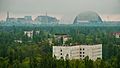 Центр города Припять на фоне 4 энергоблокаа ЧАЭС