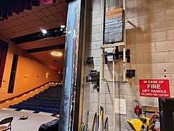 The lever and weights used to operate the fire curtain (or safety curtain) in a theatre