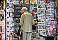 An old man in newsagent's shop, Paris September 2011
