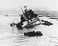 Photograph of USS Utah capsizing during the attack on Pearl Harbor.