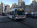 SEPTA bus 3061 at JFK Boulevard and 15th Street.jpeg