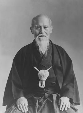 Portrait of an elderly Japanese man in traditional kimono