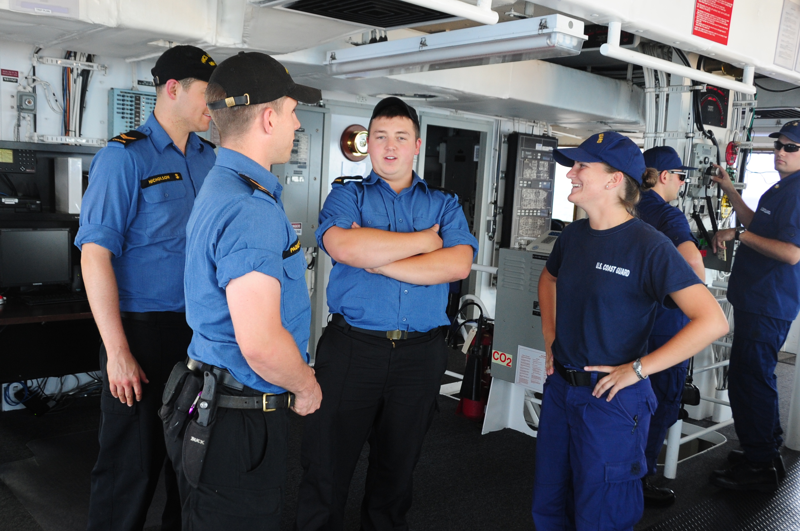 Image Us And Canadian Coast Guard Sailors On The Bridge 120814 G