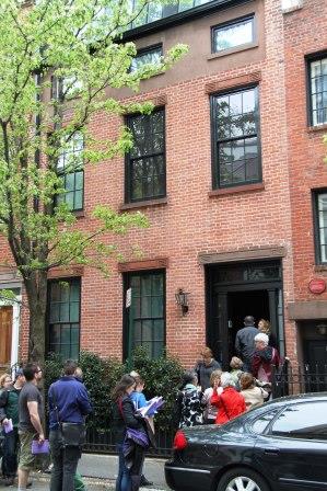 Participants in 2014 House Tour enter a house in the West Village
