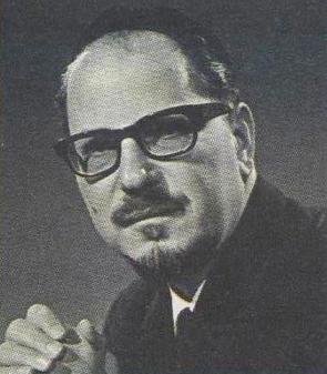 Black and white portrait photograph of Isaac Cohen wearing spectacles