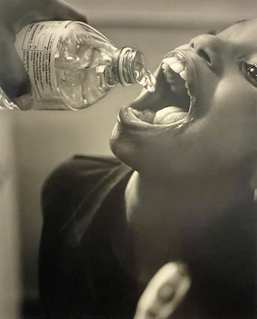 Shea Brushing Zion's Teeth with Bottled Water, 2016-2017, LaToya Ruby Frazier at NPG 2022