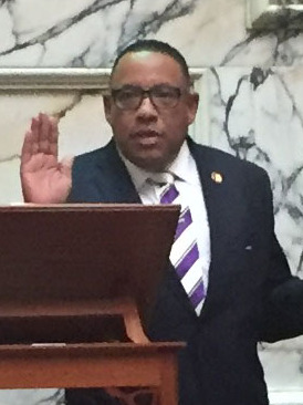 Delegate Ali being sworn in (cropped).jpg