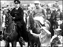 Fred Winter on Sundew after winning the 1957 Grand National.gif