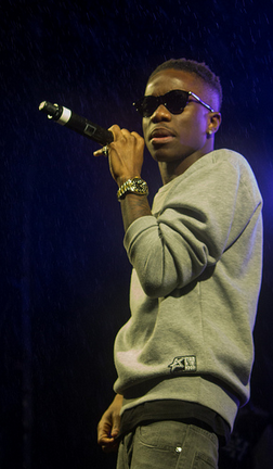 Tinchy Stryder performing in 2013.png