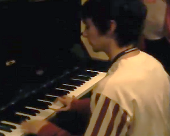 Toby Fox playing piano