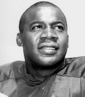 Black and white portrait of Wood wearing his Packers uniform