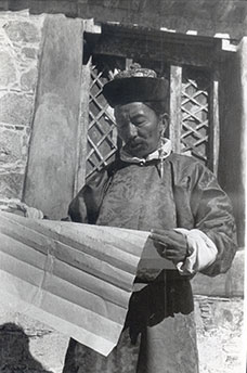 Norbu Dhondup in Lhasa, Tibet in 1937 with Tibetan government passport or Lamyig for the 1938 Everest Expedition (cropped)