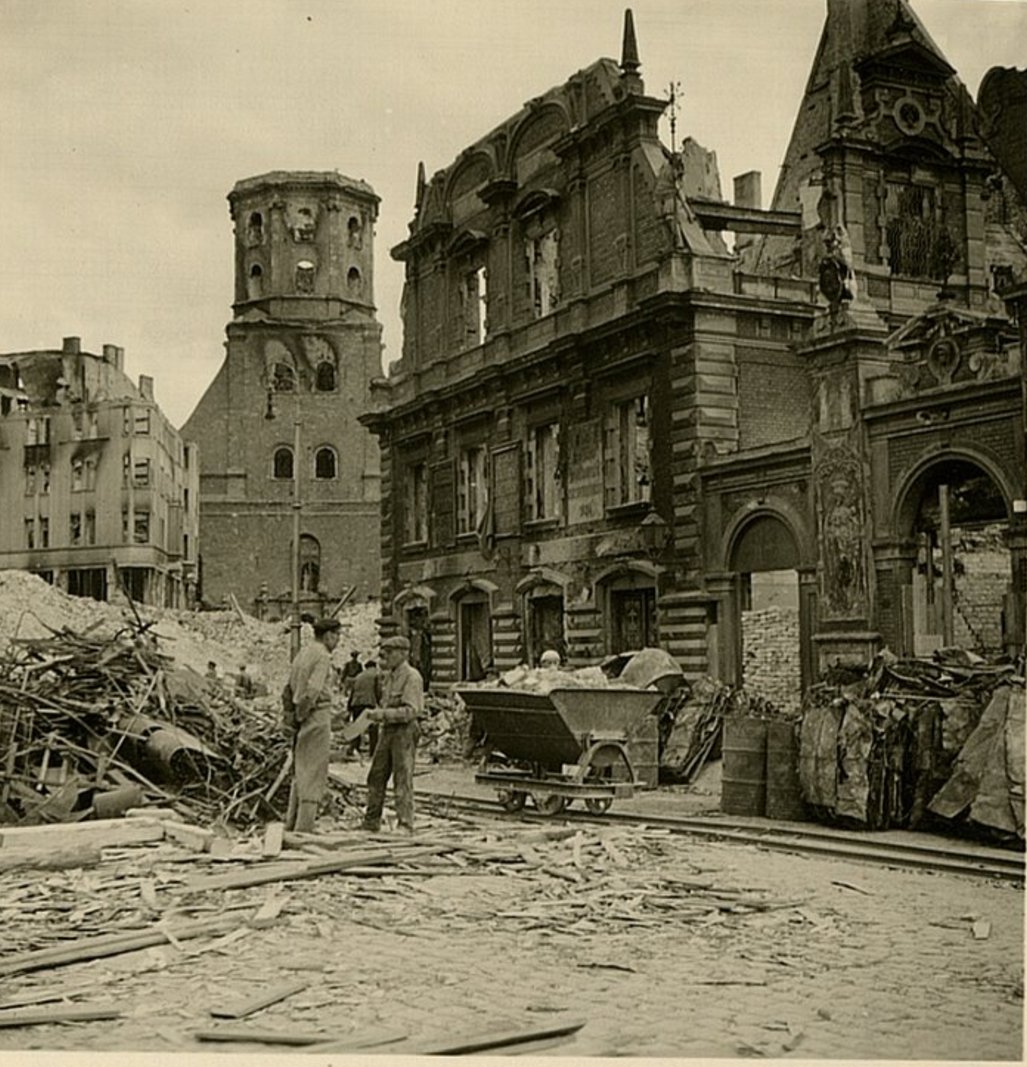 Image: Damaged buildings of the Riga Old Town and St Peter #39 s Church