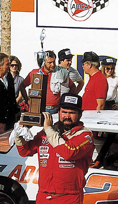 Grant Adcox with a trophy.jpg