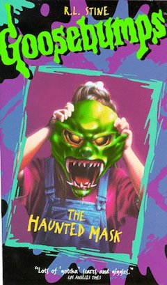 Cover art of the VHS, showing a girl holding a green Halloween mask over her face