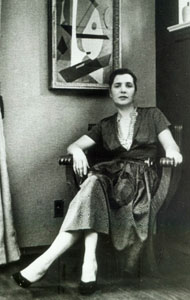 Slobodkina seated in front of Irish Elegy, c.1948-50