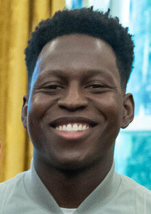 Toheeb Jimoh on March 20, 2023 in the Oval Office of the White House - P20230320AS-2576 (cropped).jpg