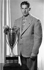 Elmer Lach with Hart Memorial Trophy.jpg