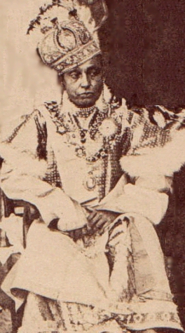 Sikandar Begum, wearing ceremonial dress and a crown