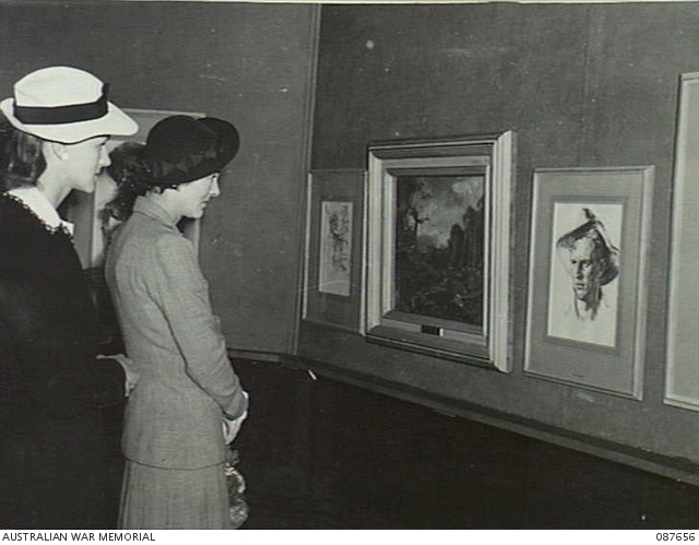 Visitors view Athenaeum exhibition