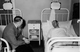 Hitler visiting Heinrich Borgmann in hospital after the failed 20 July bomb plot.png
