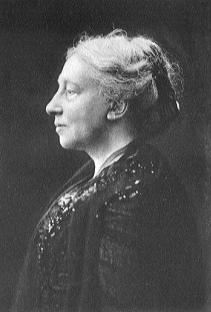 Head and shoulders profile of a dignified older woman with hair swept back and a slightly prominent nose. Underneath is the signature "Augusta Gregory".