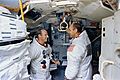 Astronauts Pete Conrad (on left) and Alan Bean are shown in the Apollo Lunar Module Mission Simulator