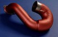 Coloured ceramic thermal barrier coating on exhaust component