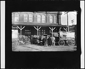 Horse-drawn wagons in front of the Center Market, 09959v