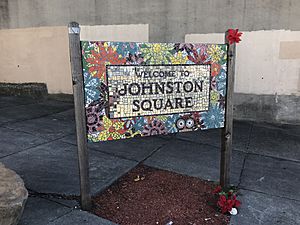 Johnston Square gateway sign at the corner of Greenmount Avenue and E. Biddle Street in Baltimore