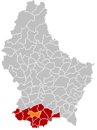 Map of Luxembourg with Mondercange highlighted in orange, and the canton in dark red