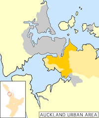 Manukau City (in orange) within the Auckland metropolitan area. The darker orange indicates the urban area.