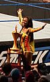 Naomi with WrestleMania trophy (cropped)
