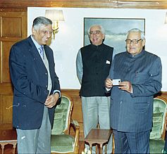 The Prime Minister Shri Atal Bihari Vajpayee is being presented with a PAN card by the Finance Minister Shri Jaswant Singh and Chairman CBDT Shri P.L. Singh, in New Delhi on January 24, 2004